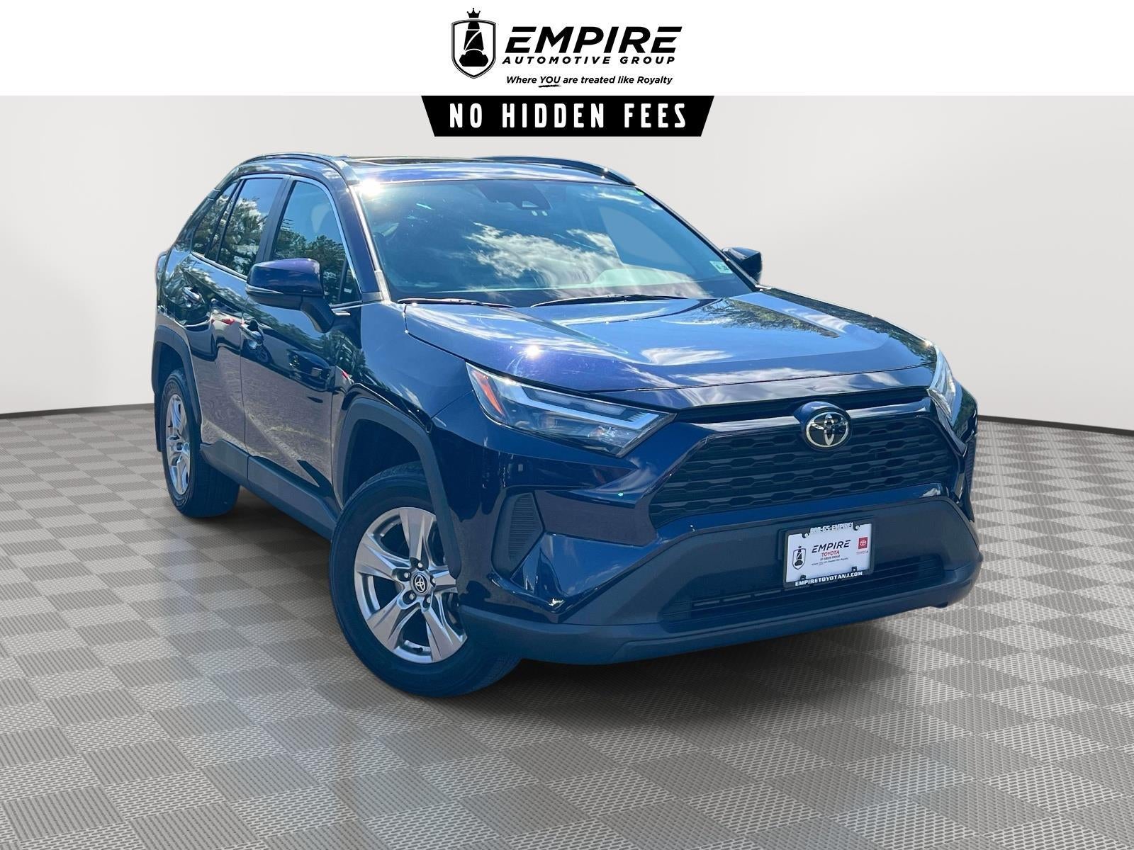 2023 Toyota Rav4 XLE in Blueprint — front three-quarter view