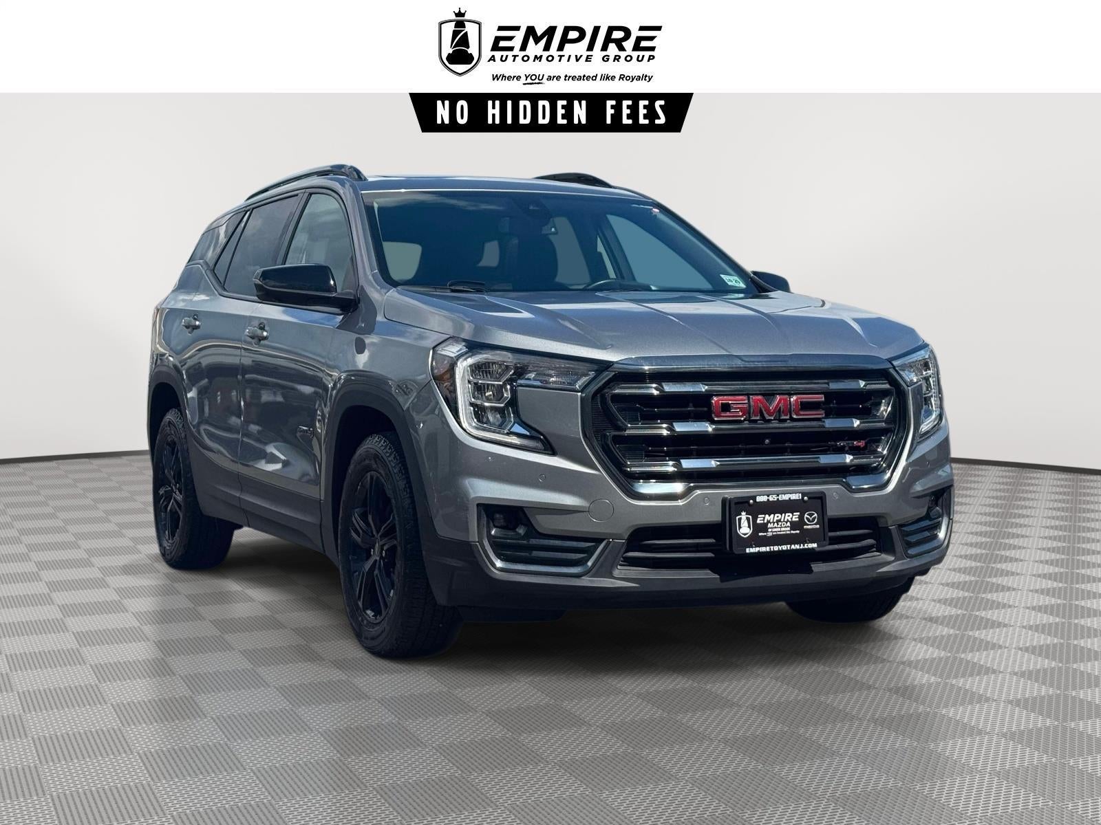2024 GMC Terrain AWD AT4 in Sterling Metallic — front three-quarter view