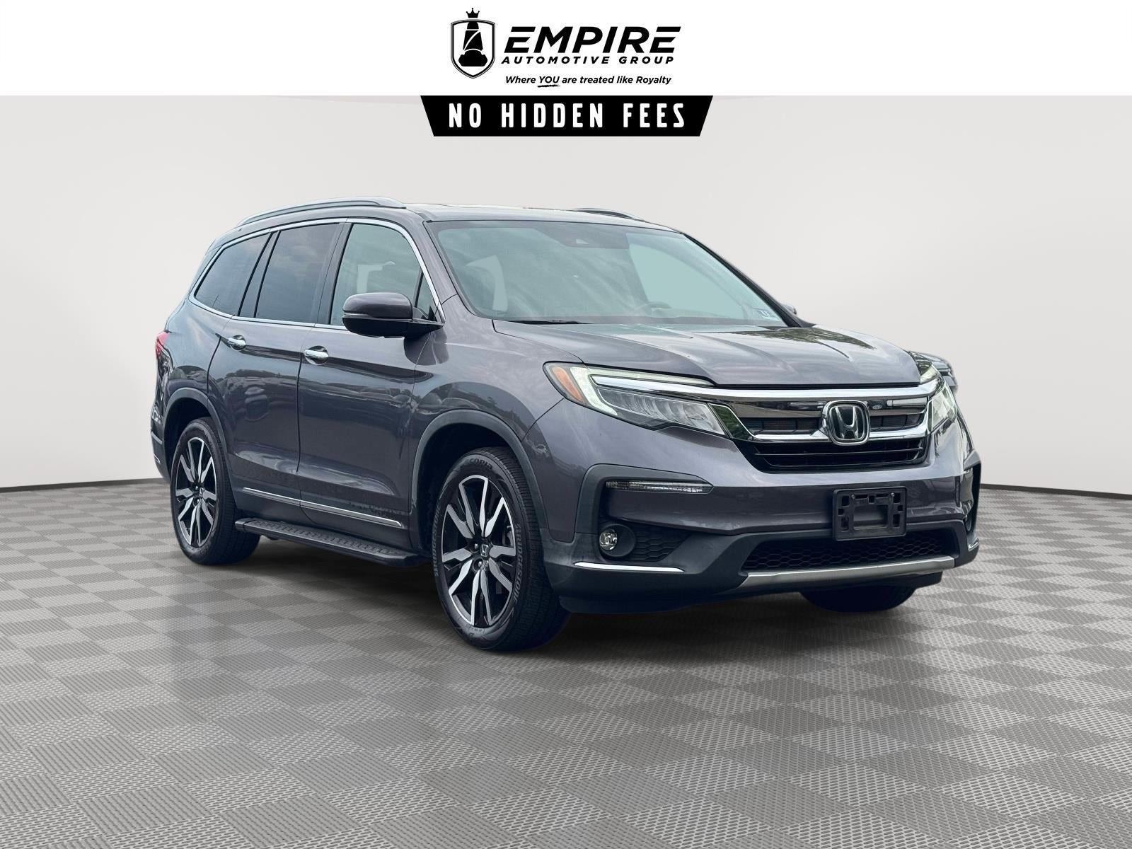 2019 Honda Pilot Touring in Modern Steel Metallic — front three-quarter view