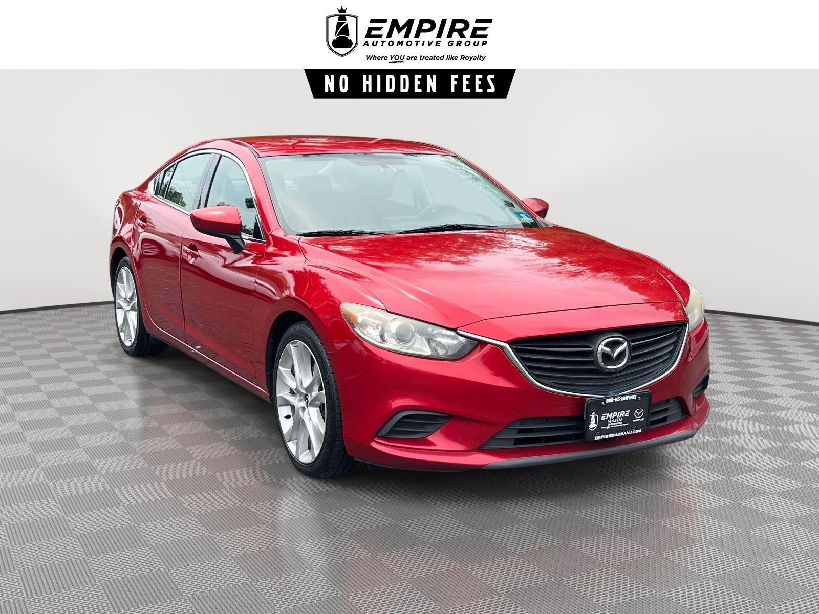 2016 Mazda Mazda6 i Touring in Soul Red Metallic — front three-quarter view