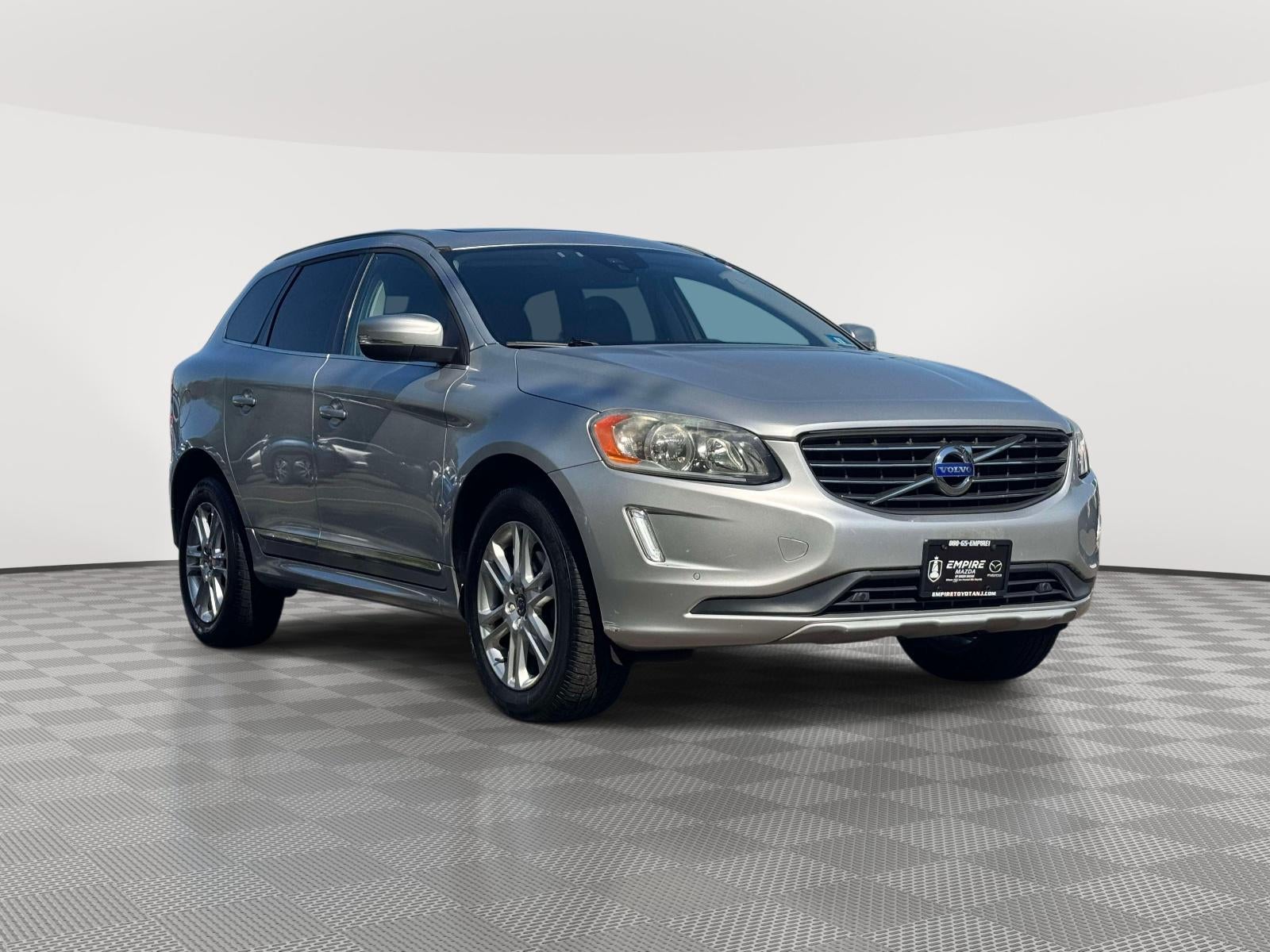 2016 Volvo XC60 T5 Premier in Bright Silver Metallic — front three-quarter view